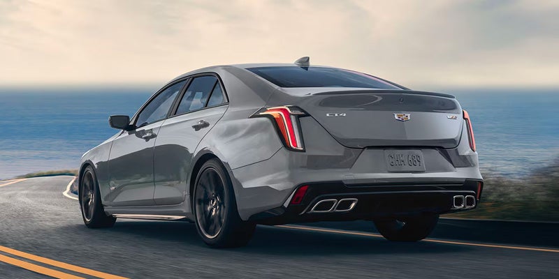 back view of Cadillac CT4-V driving on road