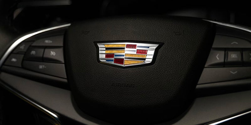 steering of CADILLAC XT5 with Cadillac logo on it