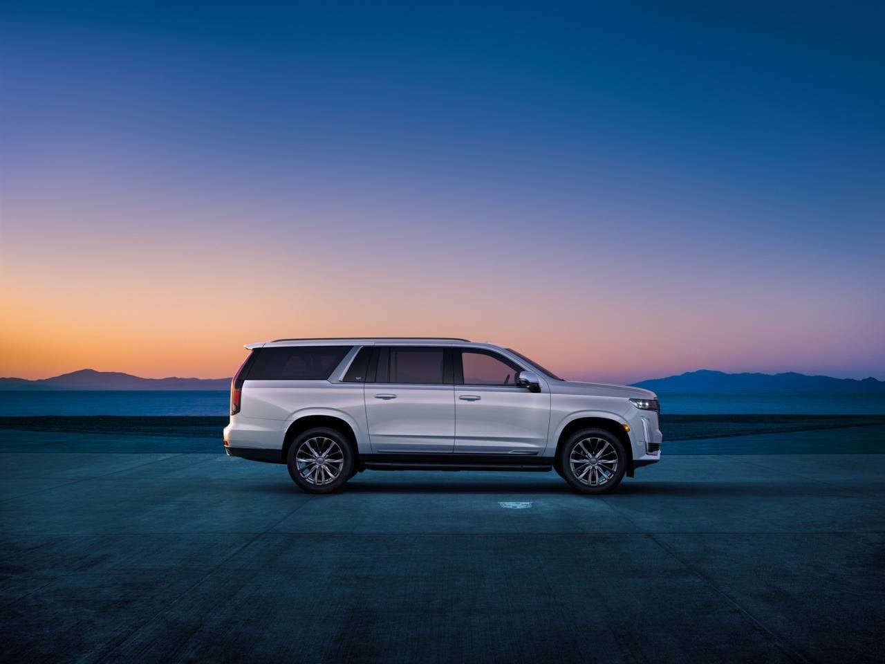 side view of an Escalade from Fitzgerald Cadillac of Hagerstown in Hagerstown MD parked in the desert 